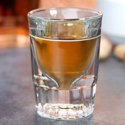 Libbey 5127/S0710 1.5 oz. Fluted Shot Glass with 0.75 oz. Pour Line