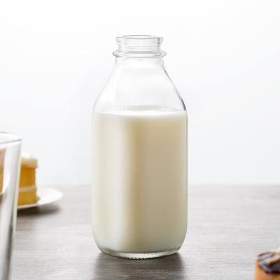 Libbey 92129 33.5 oz. Glass Milk Bottle
